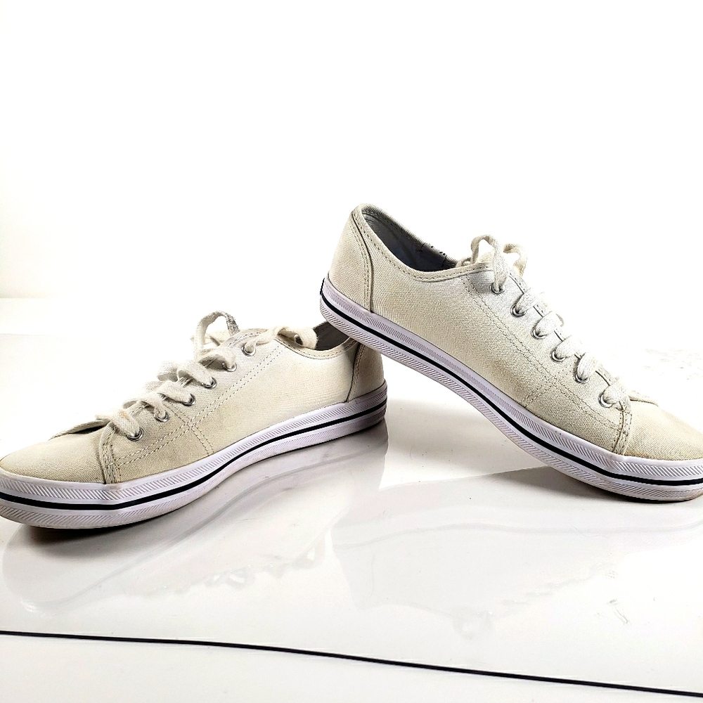White Kids tennis shoe.